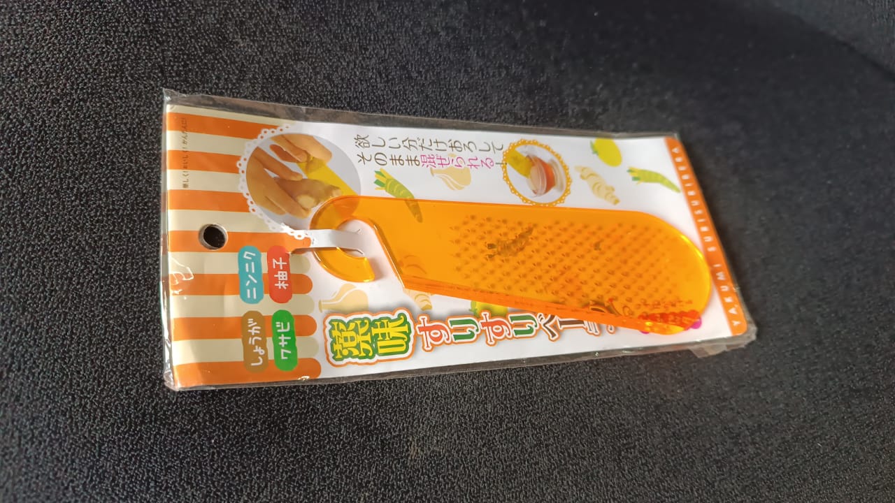 Multipurpose Garlic and Ginger Grater Peeler Tool with Hanging Hook – 1 Pc Multipurpose Garlic and Ginger Grater Peeler Tool with Hanging Hook – 1 Pc